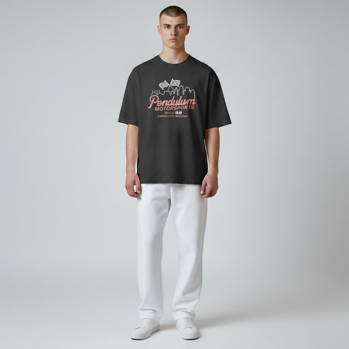 Asphalt Anthem tee artwork with Oleo and Kansas City skyline detail