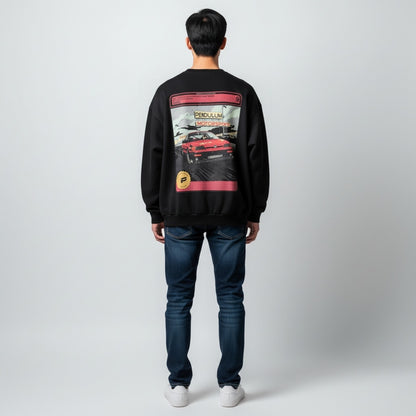 A model wearing the black 1991 Honda CRX Turbo crewneck seen from behind, showing the full comic trading-card panel of a red boosted CRX