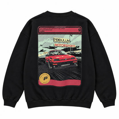 Back of the black 1991 Honda CRX Turbo crewneck showing the comic trading-card panel of a red boosted CRX with the Pendulum Motorsports wordmark and the gold Pendulum seal